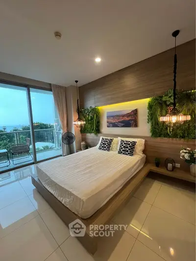 Luxurious bedroom with modern decor and stunning balcony view