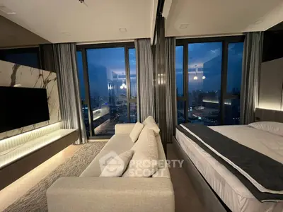 Luxurious modern living room with stunning city view, featuring sleek furniture and floor-to-ceiling windows.