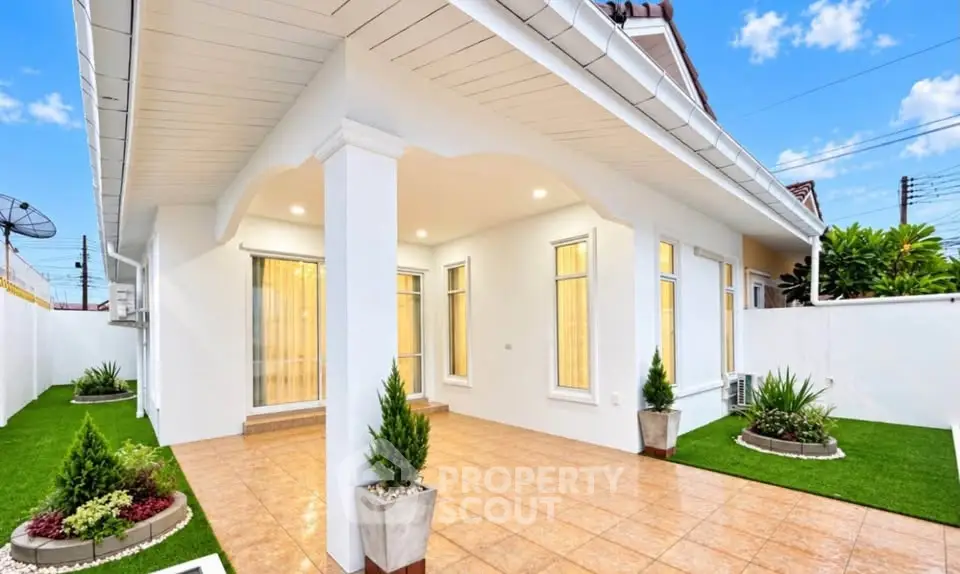 Charming single-story home with elegant exterior and lush garden, perfect for modern living.