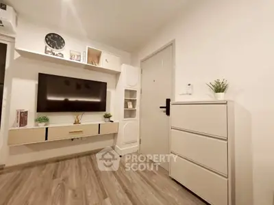 Modern living room with sleek TV setup and stylish storage solutions