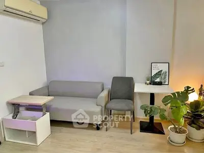 Cozy living room with modern furniture and indoor plants