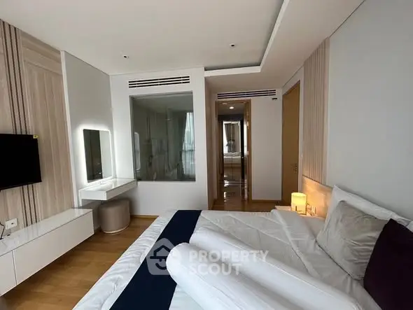 Luxurious bedroom with modern decor and cozy ambiance