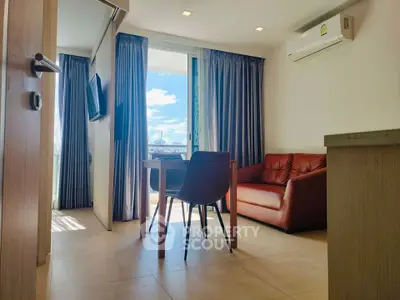 Modern living room with balcony view and air conditioning