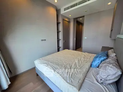Modern bedroom with cozy bed and stylish decor in a contemporary apartment