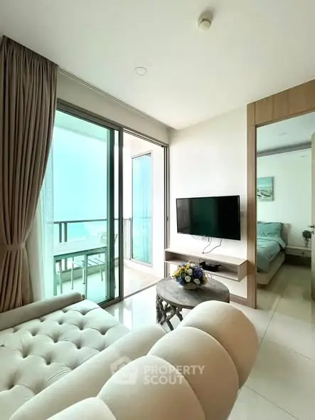 Modern living room with balcony view and elegant furnishings