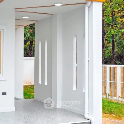 Modern exterior corridor with sleek design and natural light