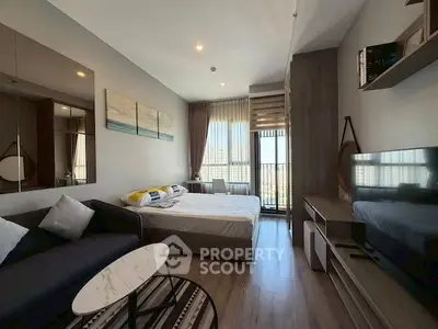 Modern studio apartment with stylish decor and natural light