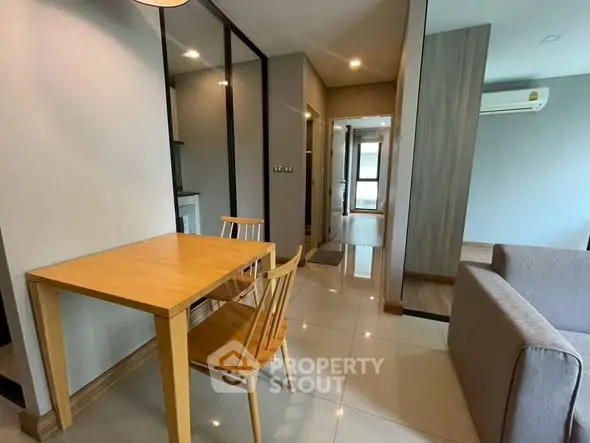 Modern apartment interior with dining area and cozy living space