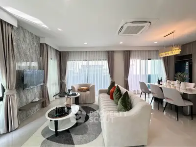 Luxurious modern living room with elegant decor and ample natural light