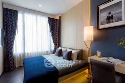 Stylish bedroom with modern decor and natural light