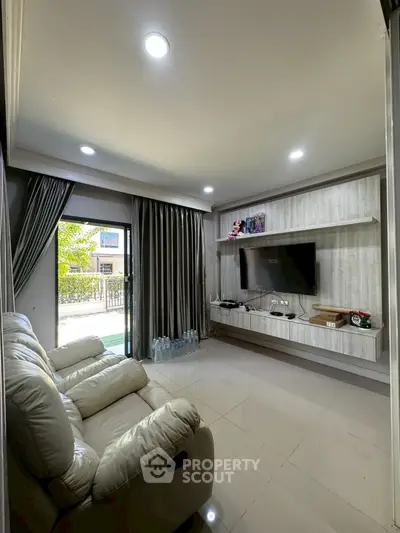 Modern living room with sleek design and natural light