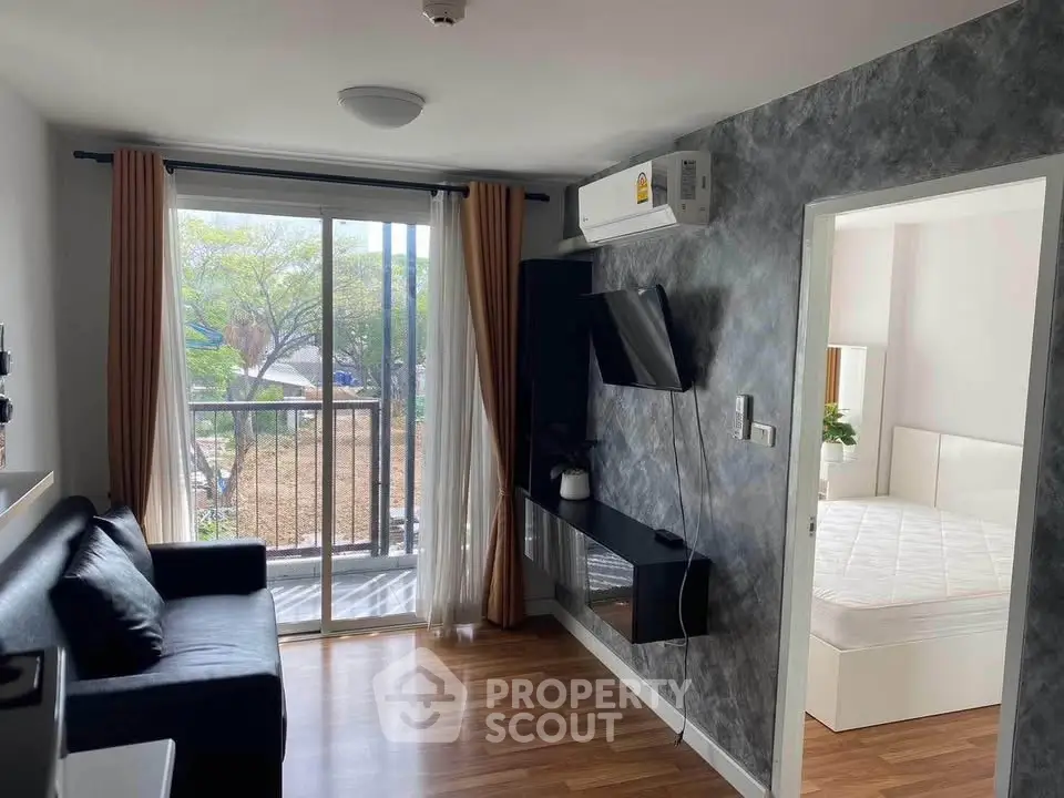 Modern living room with balcony view and sleek interior design