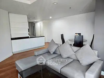 Spacious modern living room with sleek furniture and open layout