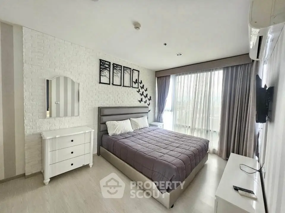 Stylish modern bedroom with elegant decor and natural light