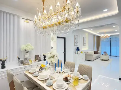 Luxurious dining room with elegant chandelier and modern decor