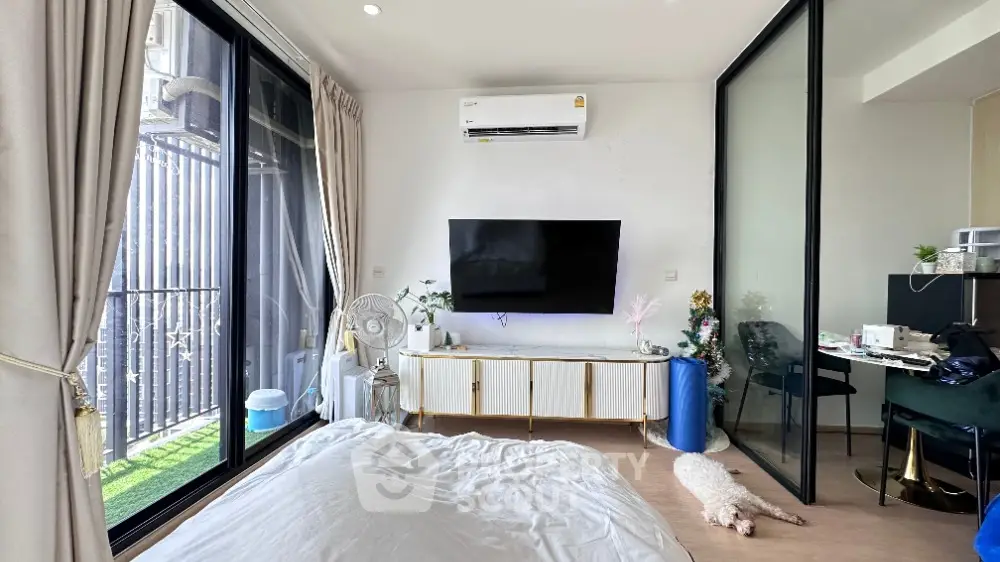 Modern bedroom with balcony access and stylish decor
