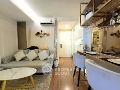 Stylish modern living room with open kitchen and elegant decor