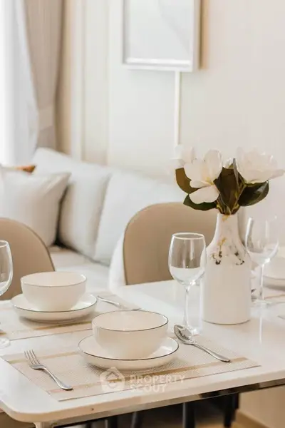 Elegant dining setup in modern living room with stylish decor