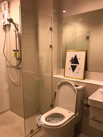 Modern bathroom with glass shower and stylish decor