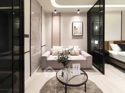 Modern living room with stylish decor and glass partitions