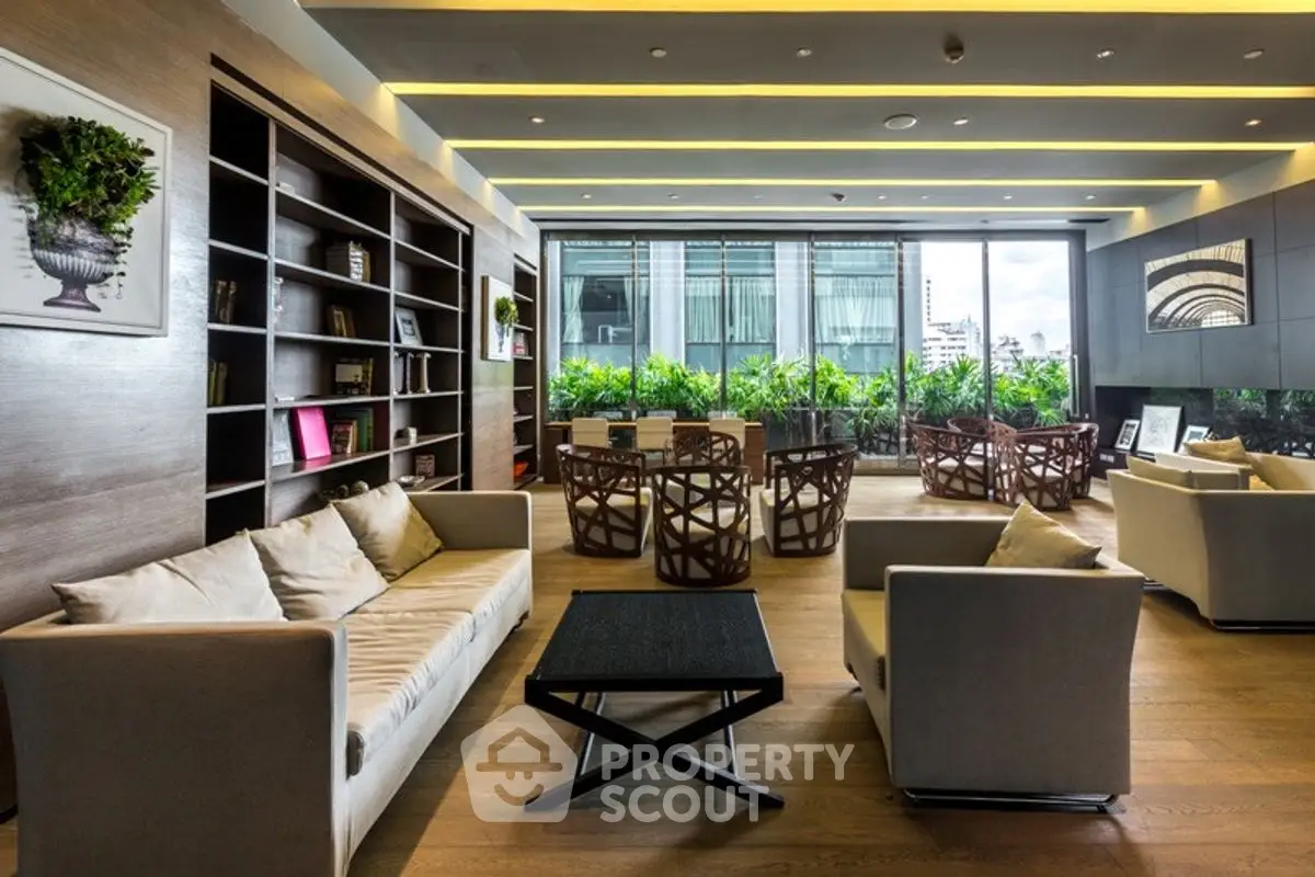 Luxurious modern living room with elegant furniture and city view, perfect for relaxation and entertainment.