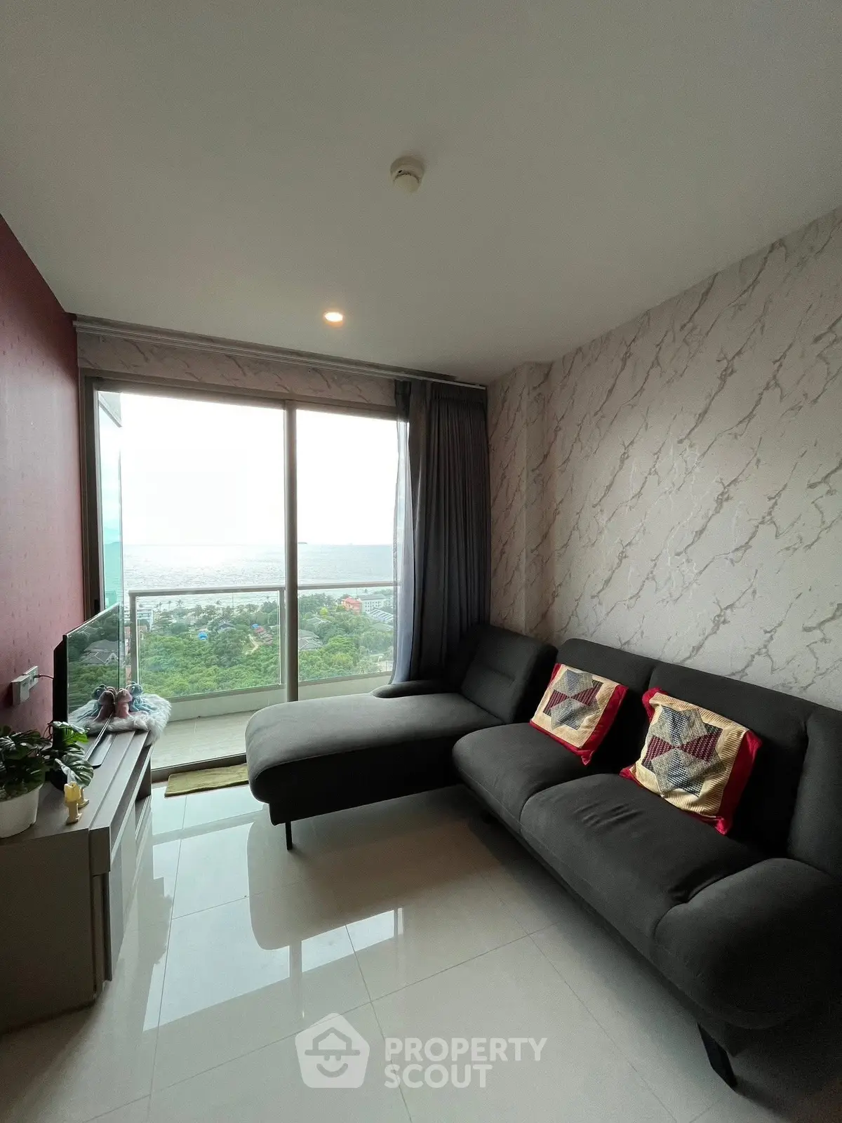 Modern living room with panoramic window and stylish decor