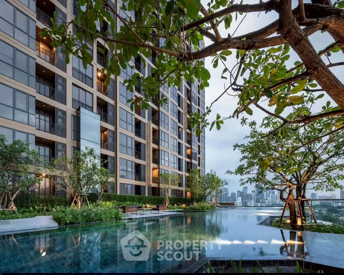 Luxurious high-rise building with stunning infinity pool and city skyline view.