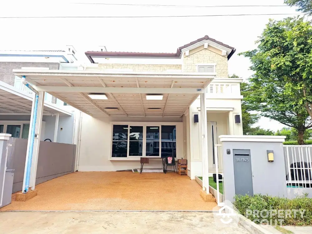 Charming two-story house with spacious driveway and modern exterior design