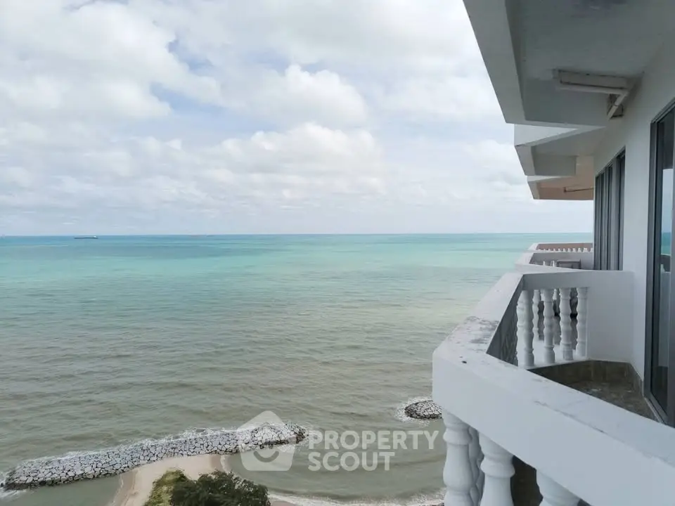 Stunning ocean view from a high-rise balcony, perfect for seaside living.