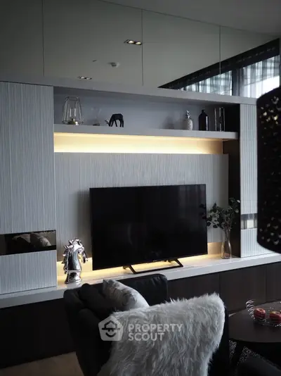 Modern living room with sleek TV setup and stylish decor