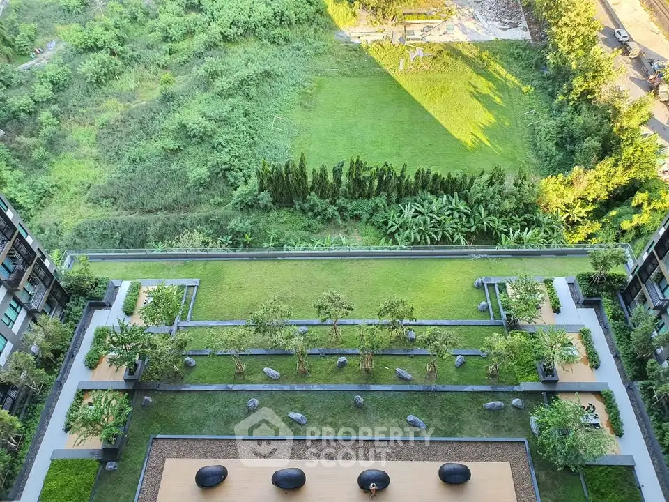 Stunning aerial view of lush green garden in modern residential complex
