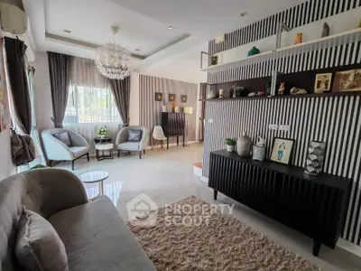 Stylish living room with modern decor and ample natural light