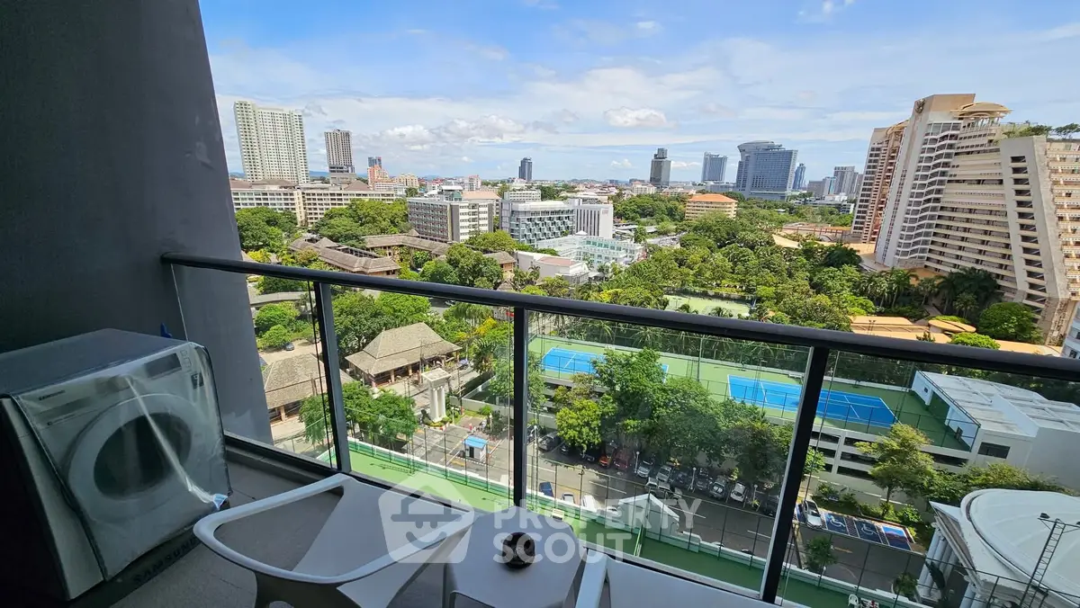 Stunning city view from high-rise balcony with modern amenities