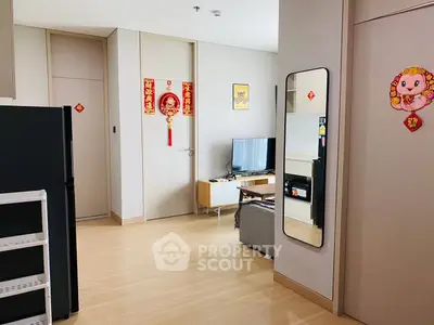 Modern living room with minimalist decor and TV setup