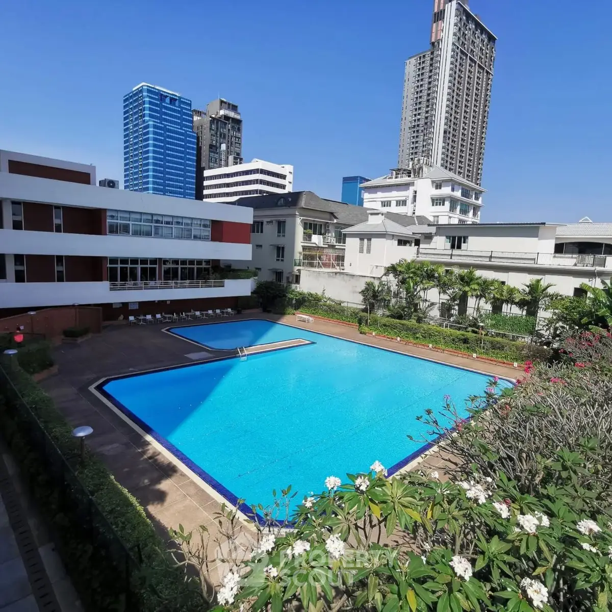 Luxurious urban swimming pool with stunning cityscape views