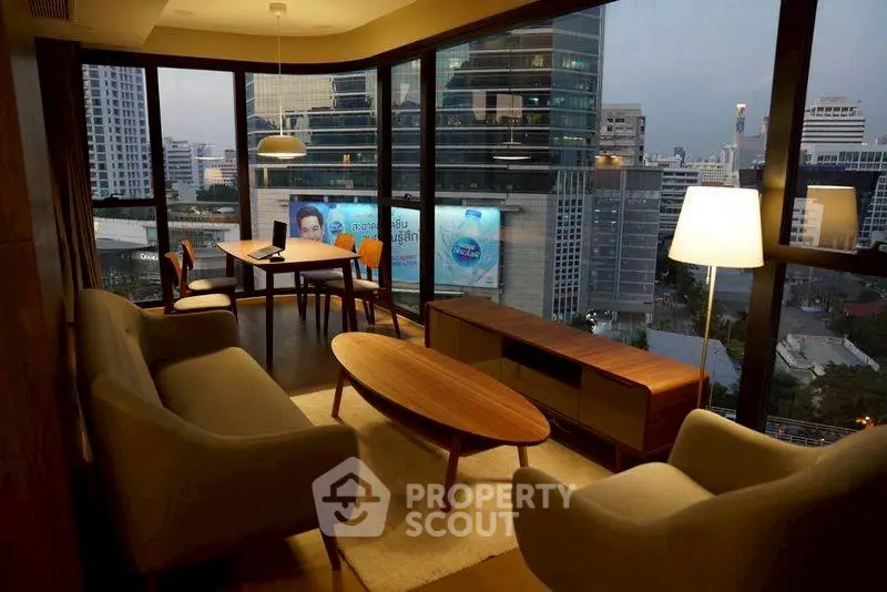 Modern living room with stunning city view and stylish furniture