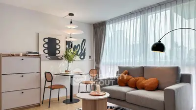 Modern living room with stylish decor and city view