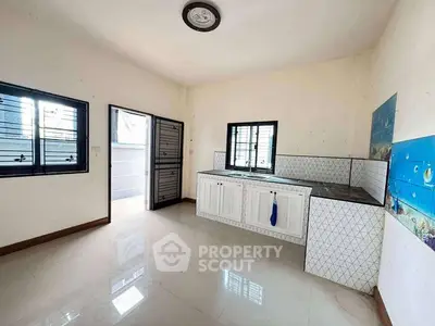 Spacious kitchen with modern design and ample natural light