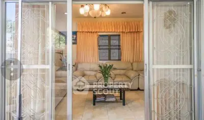 Inviting living room with elegant decor and plush seating, perfect for relaxation and entertaining guests.