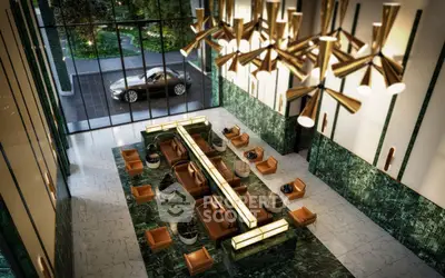Luxurious lobby with modern decor and elegant lighting in a high-end building.