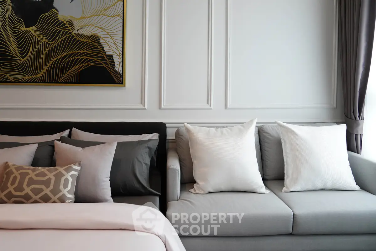 Elegant living room with modern decor and cozy seating arrangement
