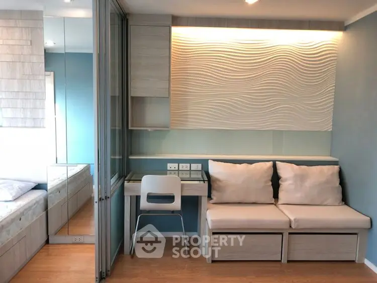 Modern studio apartment with stylish decor and functional furniture