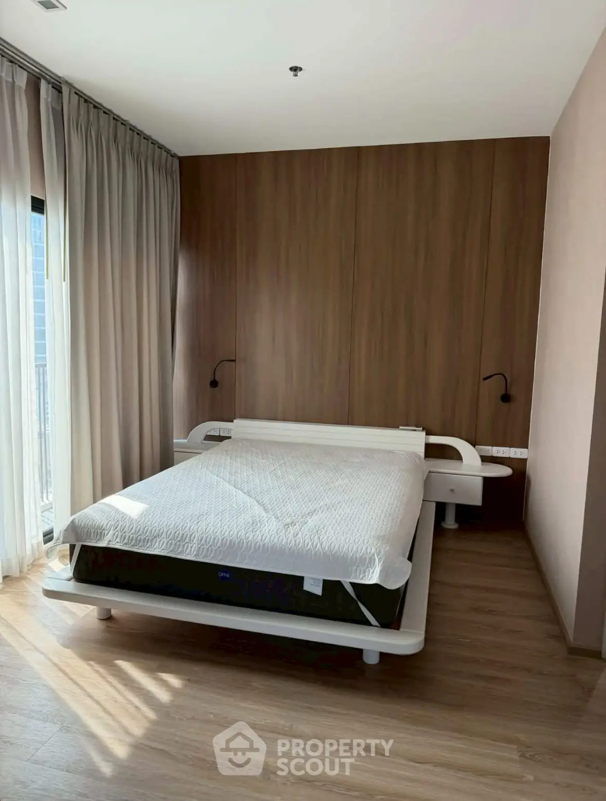 Modern bedroom with sleek design and natural light