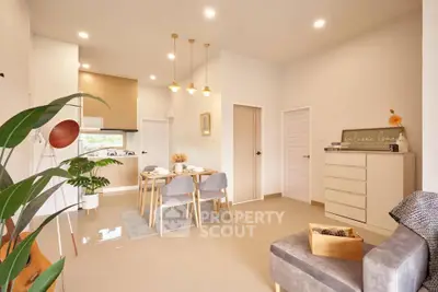 Modern open-plan living room with dining area and stylish decor