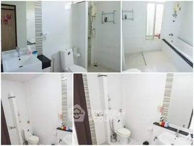 Spacious bathroom with modern fixtures and bathtub in a bright setting.