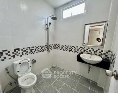 Modern bathroom with sleek fixtures and stylish tile design