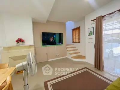 Modern living room with TV and stylish decor