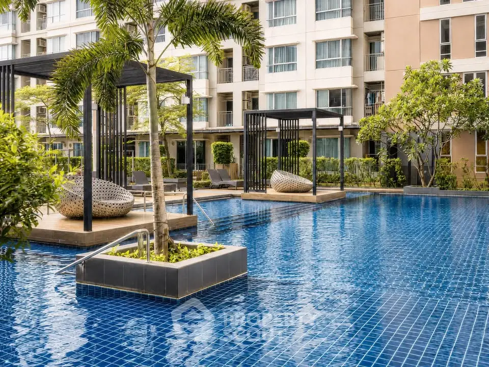 Luxurious apartment complex with stunning pool and modern cabanas