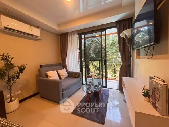 Chic living room with modern decor and balcony view, perfect for urban living.