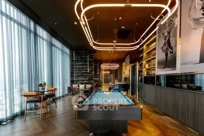 Luxurious modern living room with pool table and elegant lighting